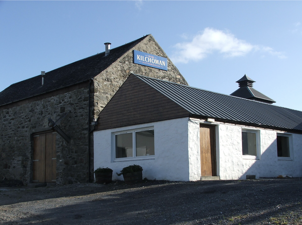 Kilchoman Distillery on Islay. Kilchoman demonstrates how long fermentation times (85 hours) and small copper stills transform phenolic heavy malt into a balanced, complex spirit